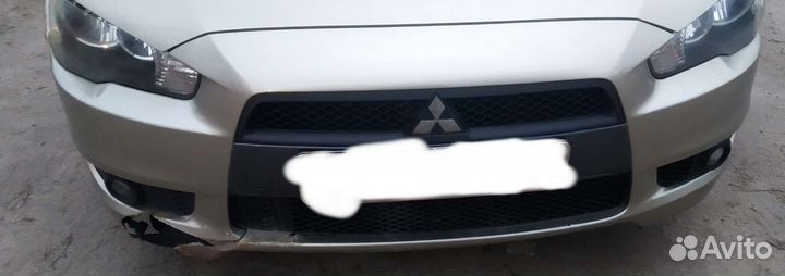 Бампер Mitsubishi Lancer 10