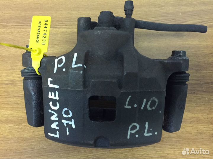 Суппорт передний левый Mitsubishi Lancer, X