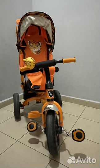Детский трехколесный велосипед с ручкой