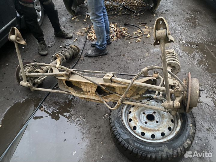 Стойка амортизатора задняя на Chevrolet Lacetti