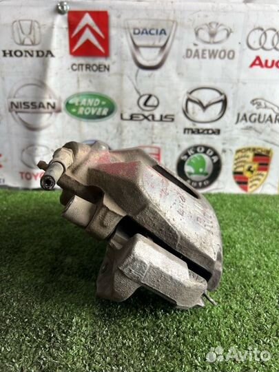 Суппорт тормозной передний правый Ford Focus 2