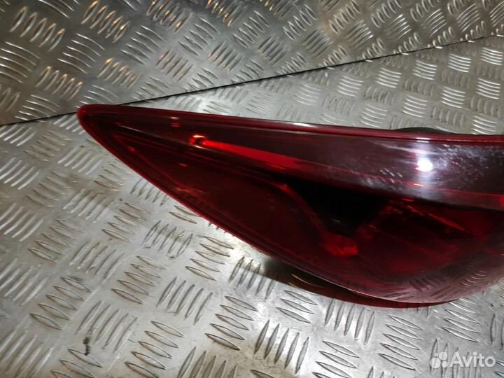 Фонарь задний наружный левый Mazda Mazda 3 BM 2013