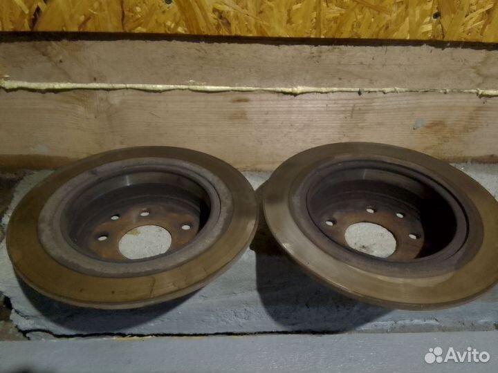 Диски тормозные задние на Ниссан qashqai j10