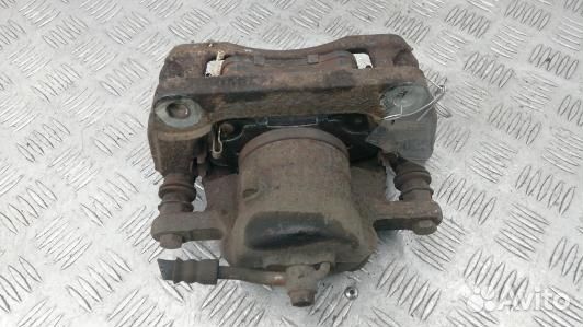 Суппорт тормозной передний правый KIA venga 1 (MPH03N701)