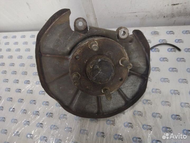 Кулак поворотный задний правый Mazda 323 Bj