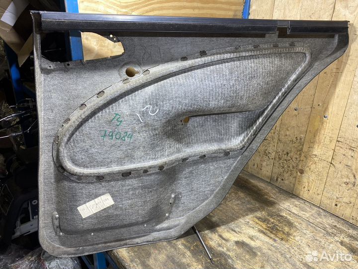Обшивка задней левой двери Октавия Тур 79084