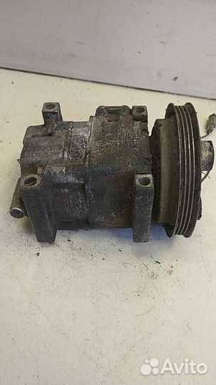 Компрессор кондиционера Mazda Familia