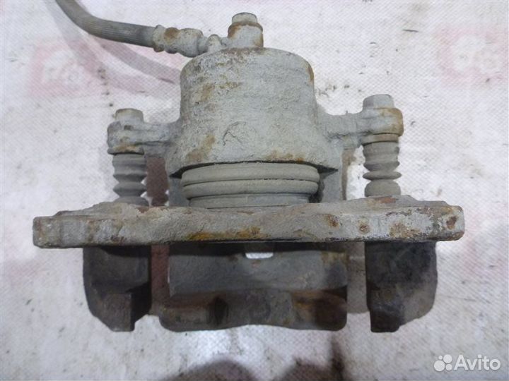 Суппорт передний левый Nissan Almera N15 GA14 1997