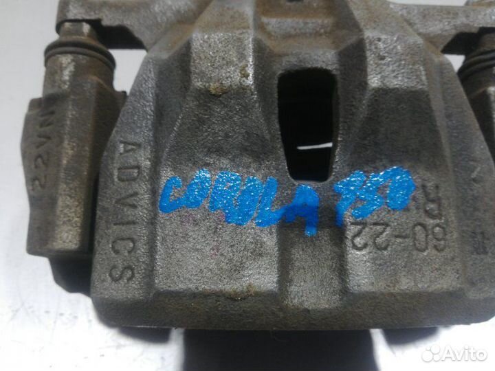 Суппорт передний правый Toyota Corolla 150