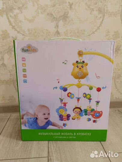 Мобиль в кроватку музыкальный