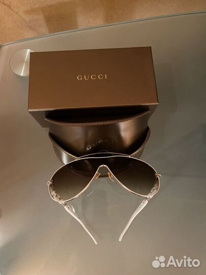 Солнцезащитные очки Gucci