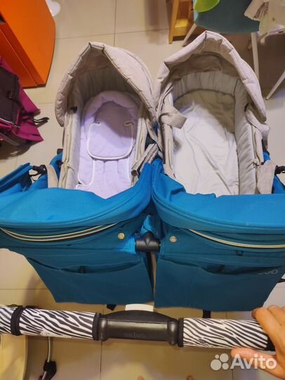 Коляска для двойни новорожденных