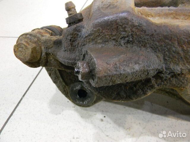 Суппорт передний левый