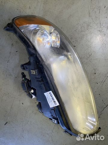 Фара левая 30698850 Volvo XC70 V70 SZ59 SW59 30698