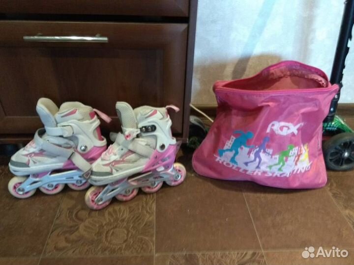 Роликовые коньки розовые