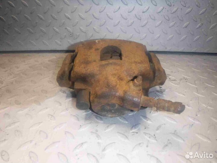 Суппорт тормозной передний правый Ford Fiesta