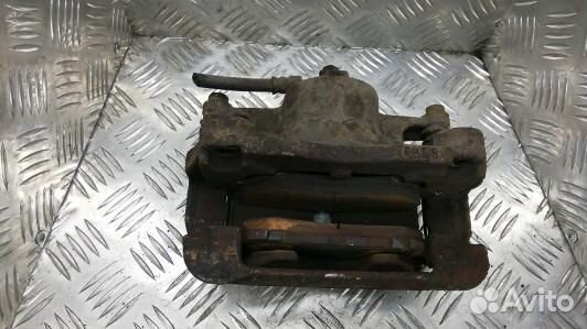 Суппорт тормозной передний левый nissan qashqai J1