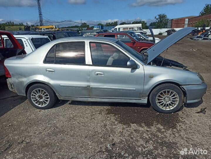 Бачок омывателя с мотором Geely CK 1 Otaka