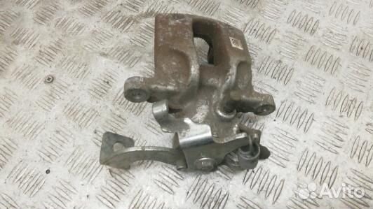 Суппорт тормозной задний левый toyota corolla E15