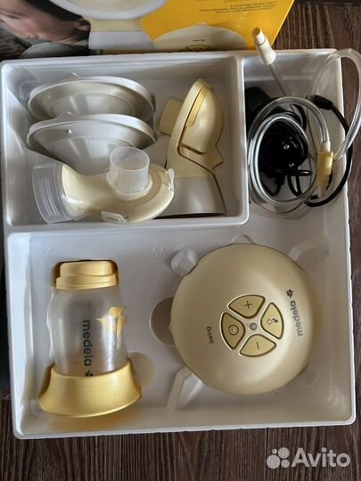 Молокоотсос medela swing flex электрический