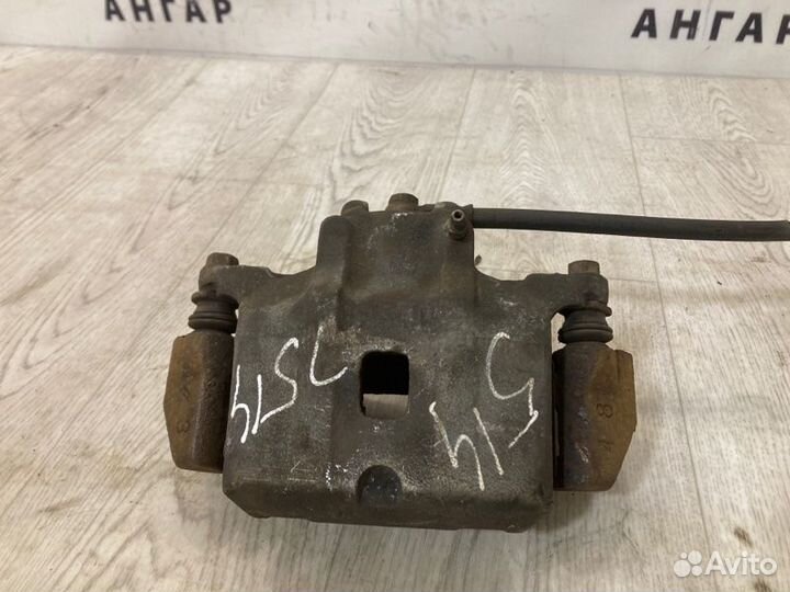 Суппорт передний левый Mitsubishi Lancer 9 CS3A