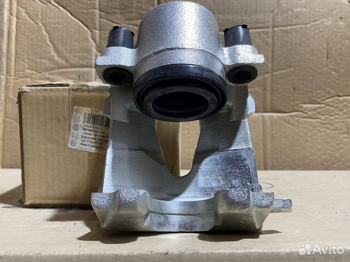 Суппорт тормозной передний левый VAG Новый