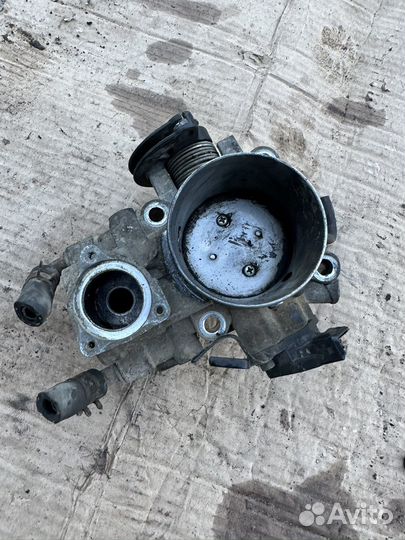 Дроссельная заслонка Mitsubishi Lancer 9