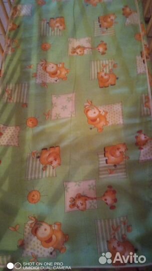 Детская кроватка с маятником и ящиком