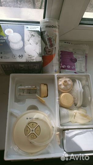 Молокоотсос электрический Медела+подушка