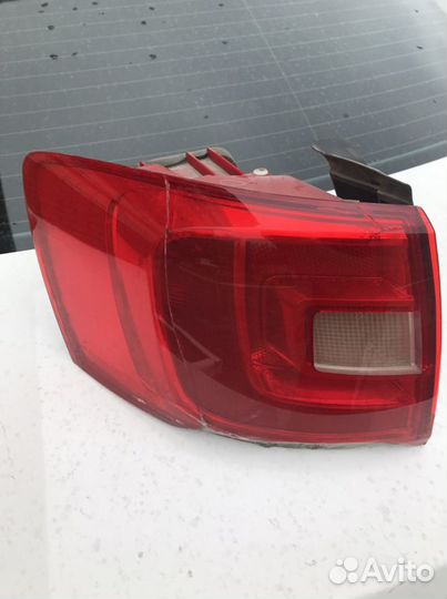 Фонарь левый наружний jetta 6