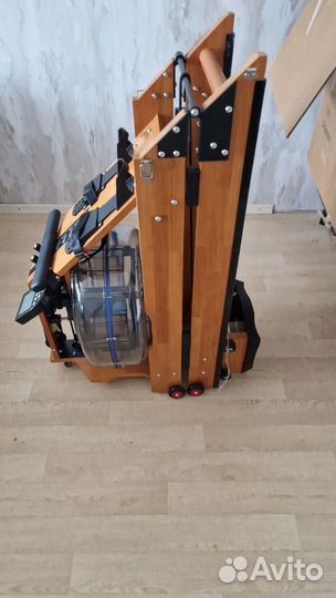 Гребной тренажер новый