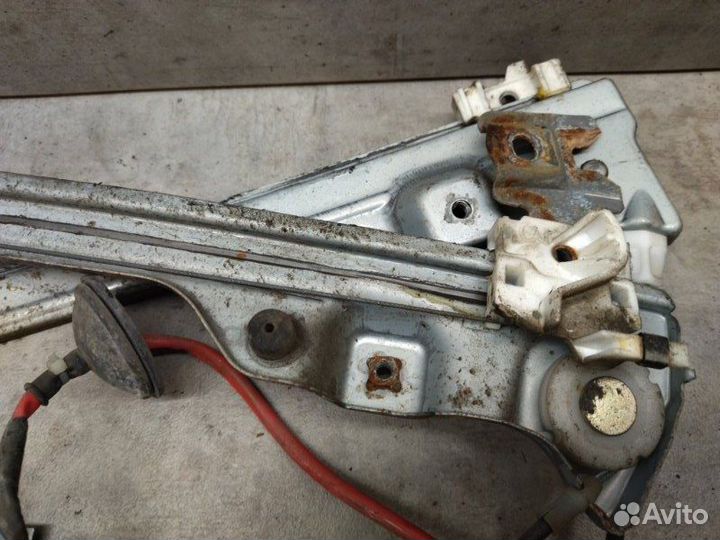 Стеклоподъемный механизм передний левый Nissan