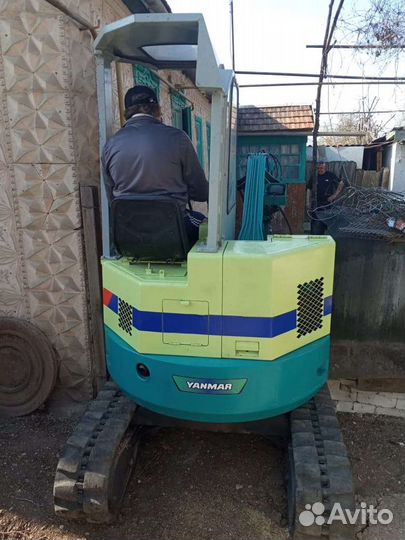 Миниэкскаватор