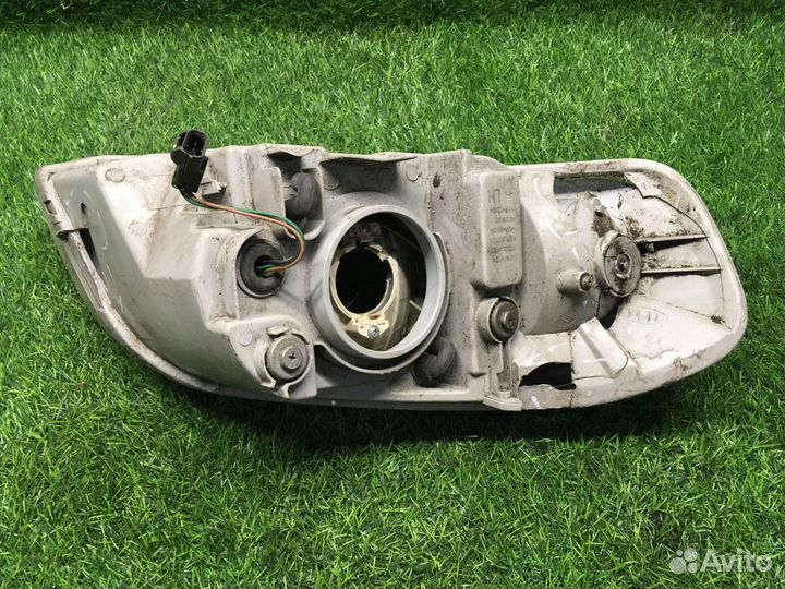 Фара левая Chevrolet Aveo T250