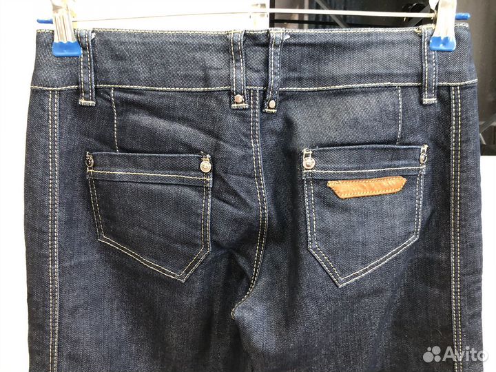 Джинсы клеш от бедра 42-44