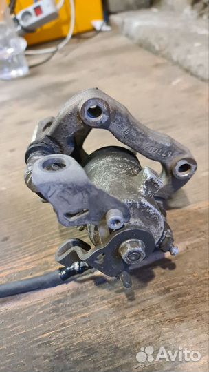 Суппорт тормозной задний левый volkswagen polo