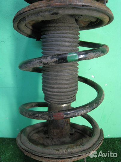 Стойка амортизатора передняя левая KIA Cerato (LD