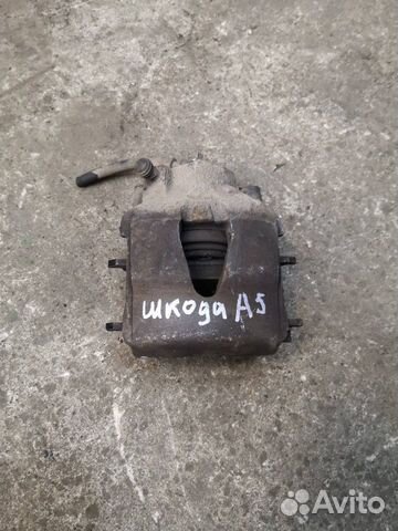 Суппорт тормозной передний правый Skoda Octavia