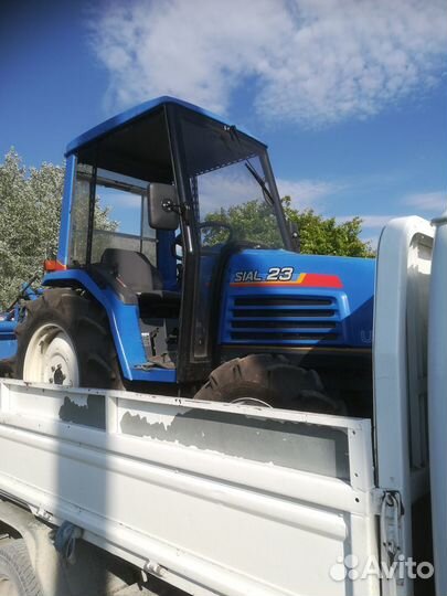 Вспашка земли мини-трактором