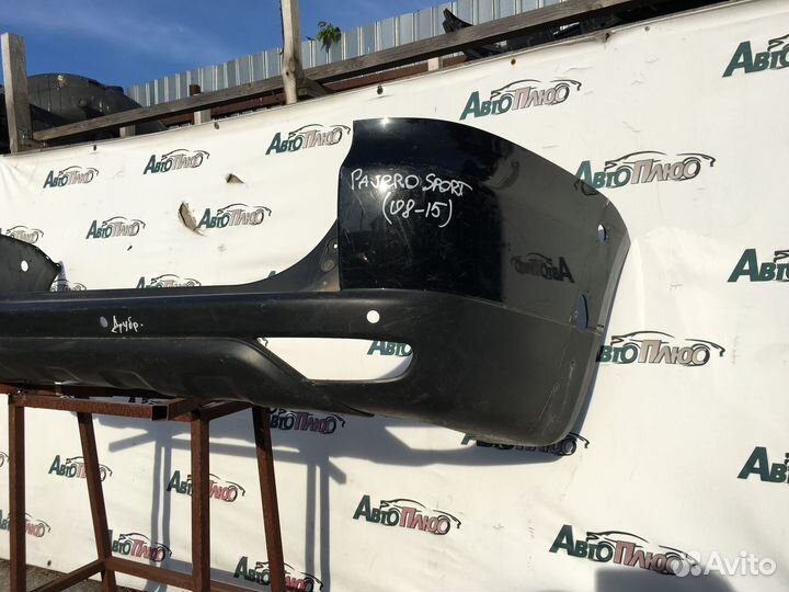 Задний Бампер Mitsubishi Pajero Sport 2 KH