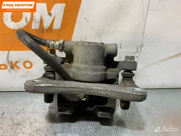 Суппорт тормозной задний правый Mitsubishi Lancer