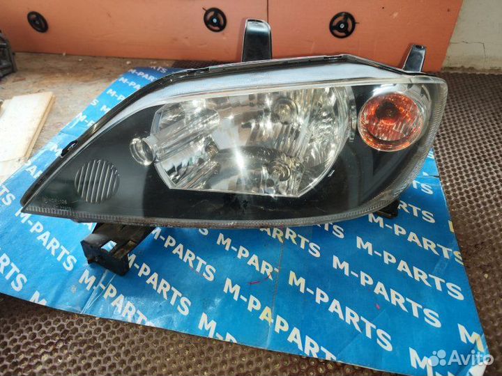 Фара передняя левая Mazda Demio DY3W