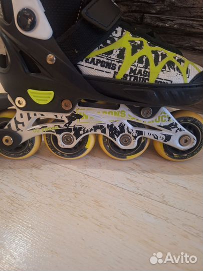 Роликовые коньки