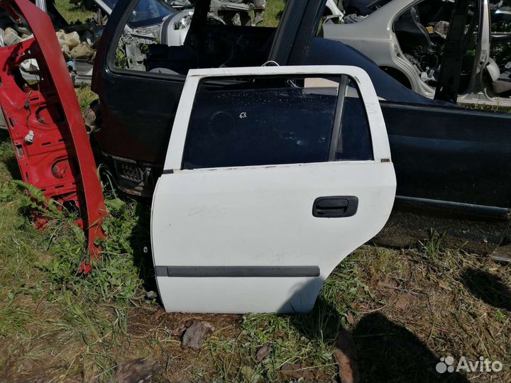 Двери задние Opel Astra G
