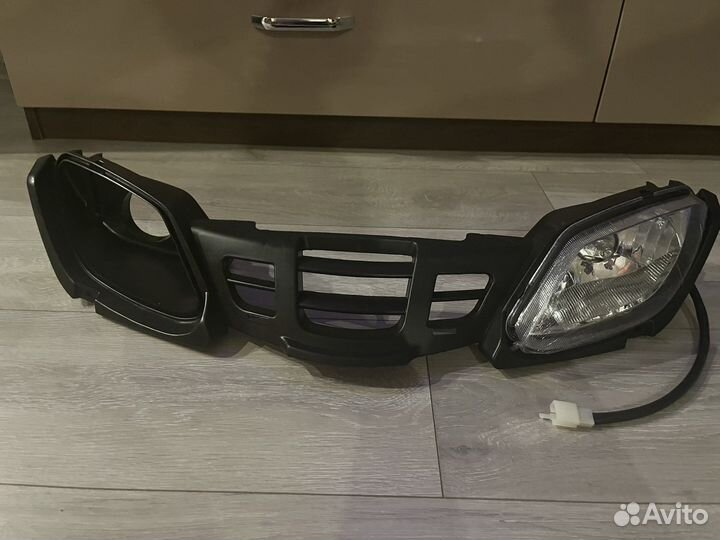 Решетка радиатора с левой фарой на квадроцикл atv