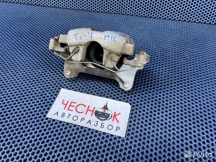 Суппорт тормозной передний левый VW Tiguan NF