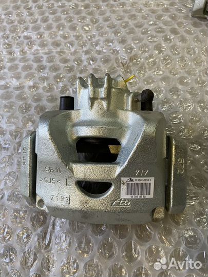 Суппорт передний левый Citroen Berlingo/Partner