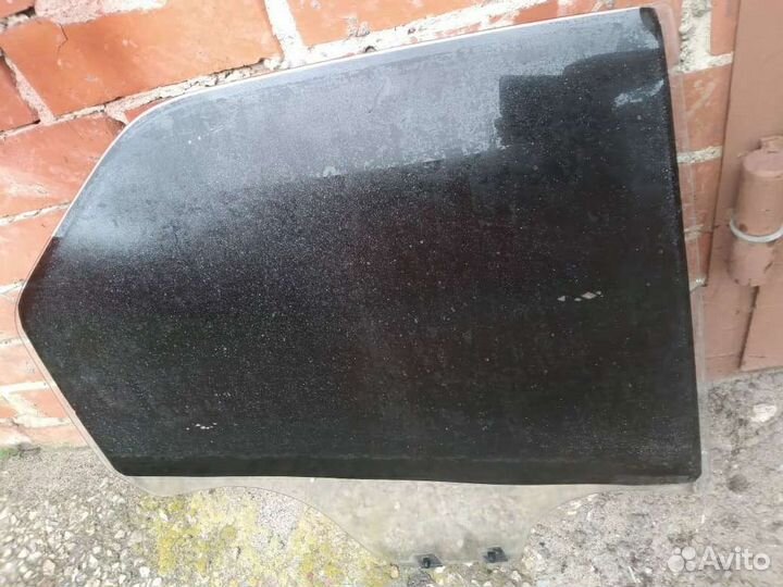 Стекло задней правой двери Renault Logan 1