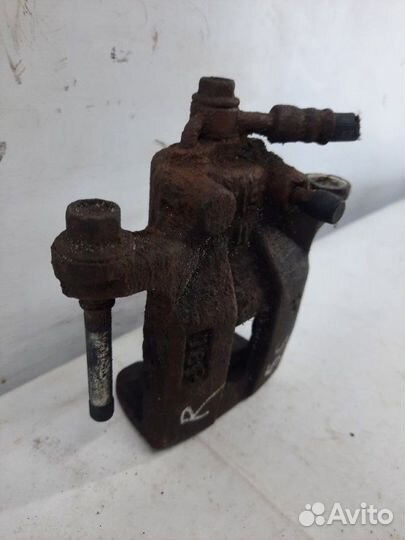 Суппорт тормозной задний правый Nissan X-Trail