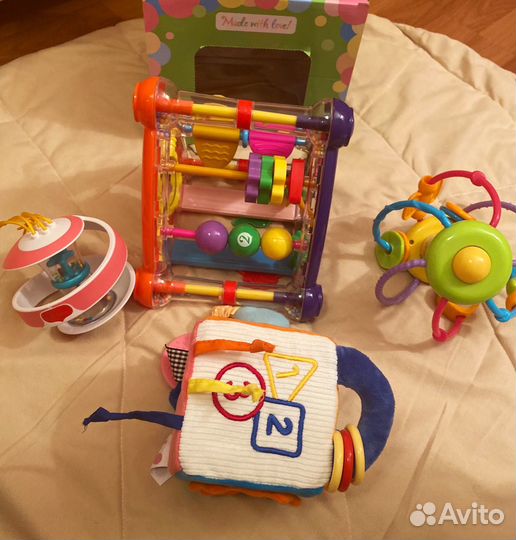 Развивающие игрушки для малышей до года